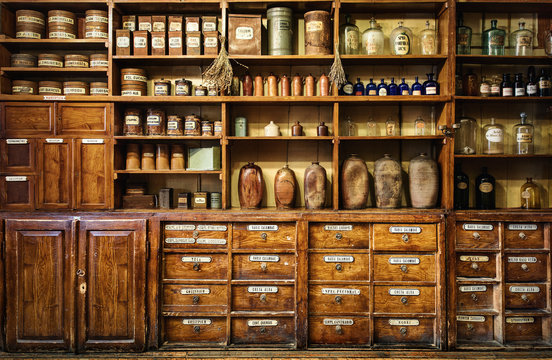 Bottles on the shelf in old pharmacy. Retro style.