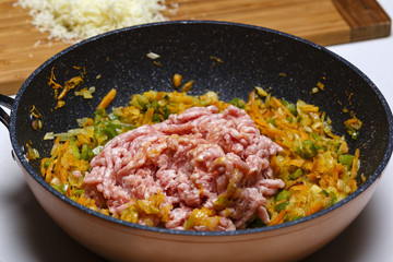 Wok with chopped vegetables and meat prepared for cooking