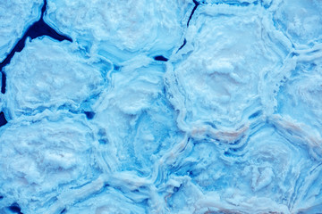 Winter abstract natural background, ice floe, a block of ice. Nature background. Winter nature.