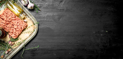 Fresh minced meat with garlic and spicy herb.