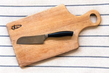 Knife on Cutting Board.