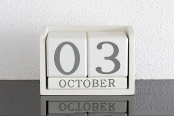 White block calendar present date 3 and month October