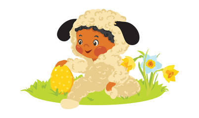Baby boy in lamb costume with decorative egg