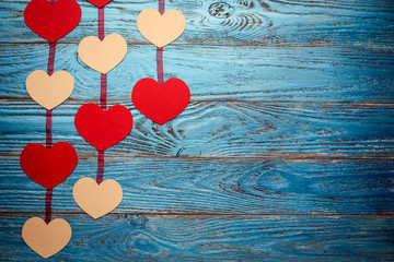 Valentines day background decorated with red hearts/copy space