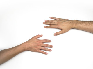 Hands reaching to each other on the floor