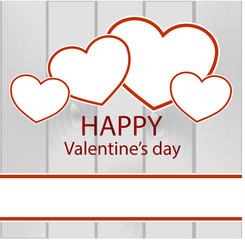 Valentine’s Day background with hearts  on a wooden background