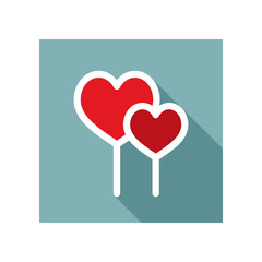 Two red heart lollipops icon