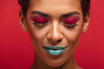 Macro image of charming african american woman being fashionable and trendy wearing colorful...