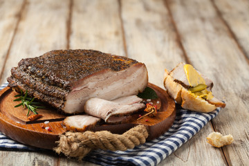 Baked whole pork bacon.