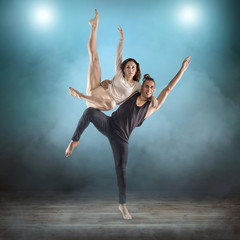 Two person, dancers, woman and man in dynamic action figure pose