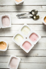 Fruit yogurt with spoons.