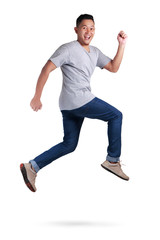 Levitation. Young Asian man jumping dancing walking