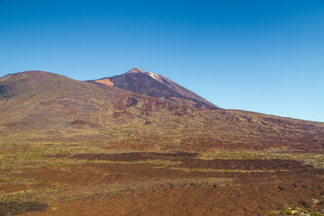 Fototapeta na wymiar Teide National Park, Tenerife, Canary Islands - A picturesque view of the colourful Teide volcano, or in spanish 'Pico del Teide'. The tallest peak in Spain with an elevation of 3718 m