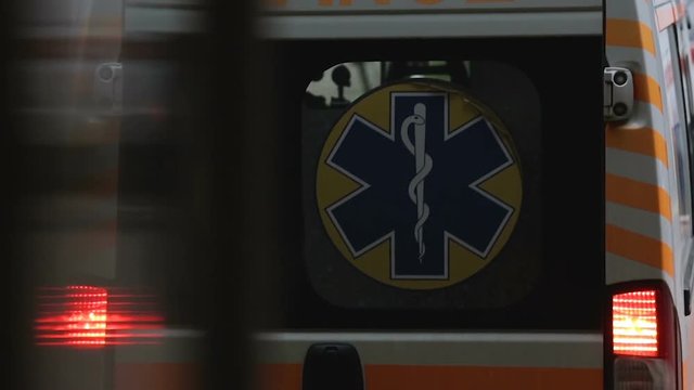 Back side of ambulance transport, paramedics team readiness, healthcare service