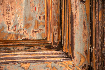 Close-up - wooden structure and carved elements on the door. Background image