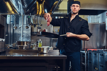 The chef in a kitchen.