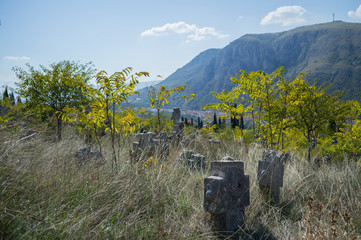 Christian Cemetery with Mountain Backdrop in Mostar, Bosnia and Herzegovina