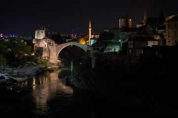Fototapeta na wymiar Old Bridge (Stari Most), Neretva River and Old Town in Mostar at Night, Bosnia and Herzegovina