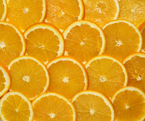The background is crumbled with fresh whole oranges sliced slices