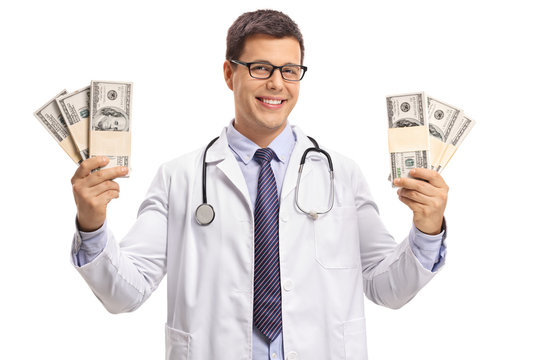 Doctor Holding Bundles Of Money And Smiling