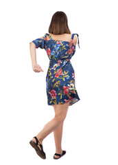 back view of running  woman.