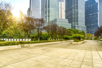 Panoramic skyline and buildings with empty concrete square floor