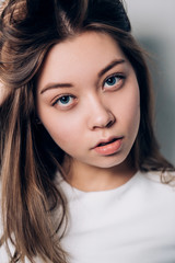 Fototapeta premium Close up portrait of beautiful girl looking at the camera