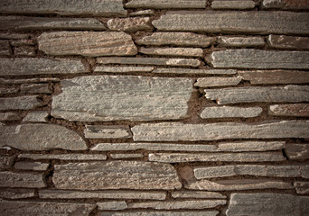 Sand colored stonework external texture background