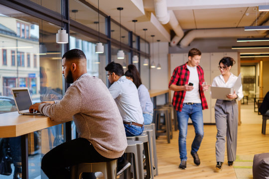 Young Specialists In Coworking Office