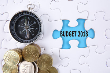 BUDGET 2018 CONCEPT: Missing piece of puzzle on white background