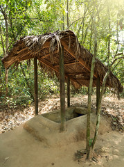 Famous Cu Chi tunnels. Entering the tunnel - Vietnam 