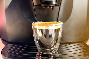 Closeup Shot Of Coffee Machine With Hot Cup Of Coffee On It