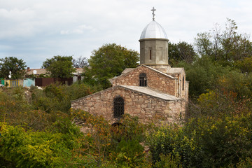 Fototapeta na wymiar Ancient Armenian stone church in Feodosia, Crimea