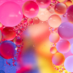 Abstract colorful Background Oil in Water surface Foam of Soap with Bubbles macro shot close-up