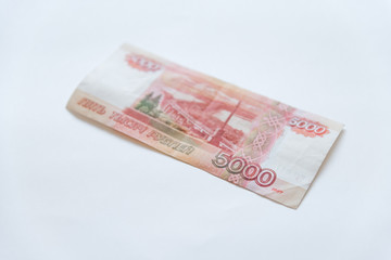 Money in Russia. Banknotes five thousand rubles, background, selective focus.