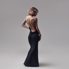beautiful woman model posing in elegant dress - 190088813