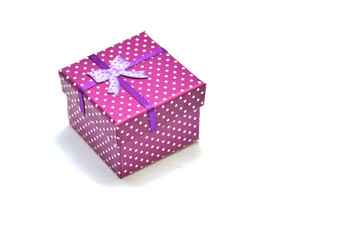 A gift box with a bow on a white background.