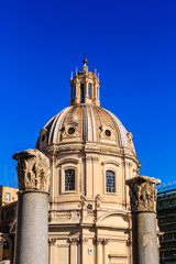 Obraz premium Church Domes Beyond Ancient Columns