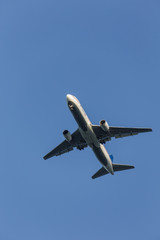 Fototapeta na wymiar Commercial Airplane Ascending from Airport