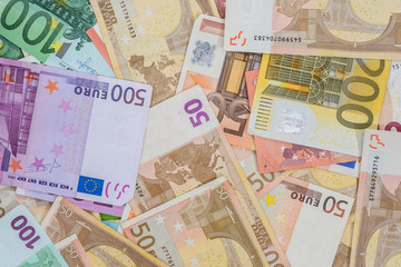 Different euro bills as background