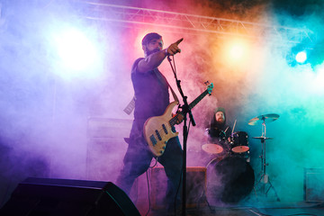 Fototapeta na wymiar Bass player perform on stage.