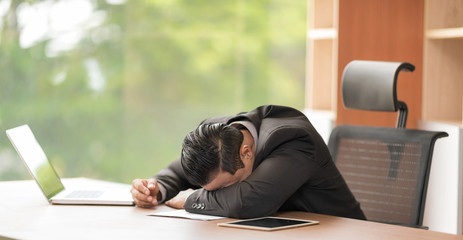 In selective focus of Business people sleeping in the conference room during a meeting. Setup studio shooting.