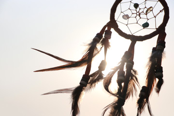 Dream catcher   vintage indian decoration and sign with sunrise background
