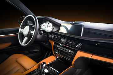 Modern luxury car Interior - steering wheel, shift lever and dashboard. Car interior luxury inside....