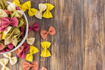 Colorful dried bowtie pasta.