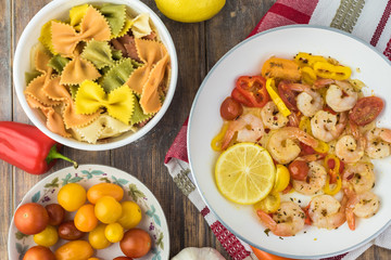 Shrimp veggie colorful bowtie pasta.