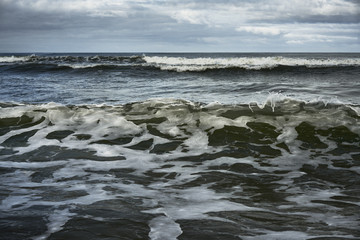 Meer Welle Wolken dunkel