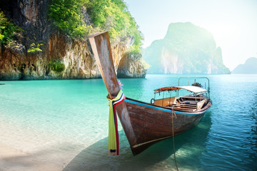 Naklejka na ściany i meble long boat on island in Thailand