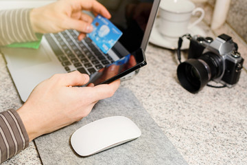 Man makes online banking transaction via internet