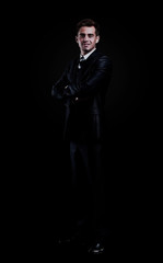 Fototapeta na wymiar businessman isolated over black background.